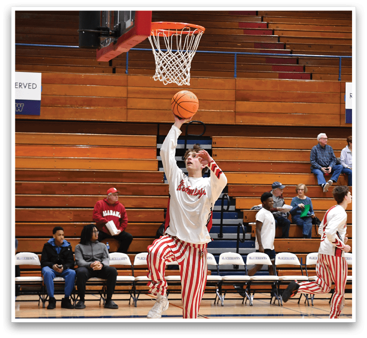A basketball player is jumping to hit the ball in a game. AI generated content