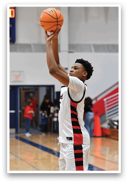 A man in a white and red jersey is holding a basketball in his hands. AI generated content