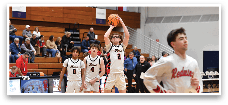 A basketball player shoots a free throw while other players watch. AI generated content
