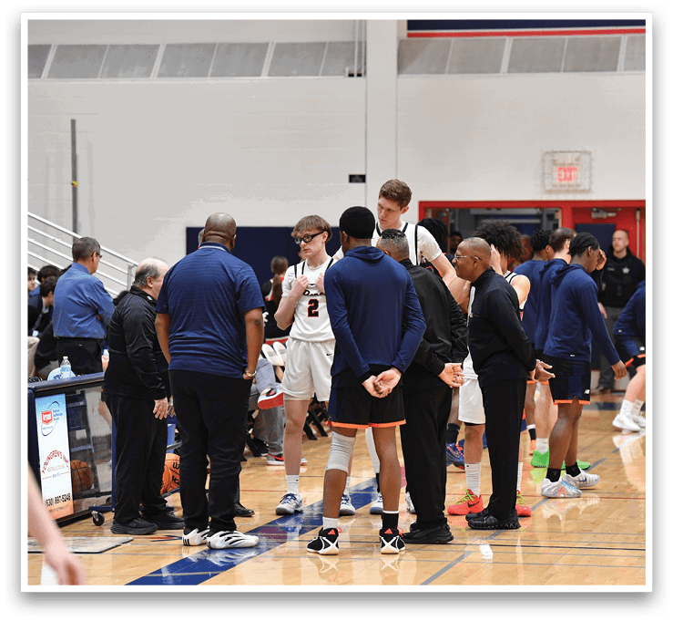 A group of men are standing on a basketball court, engaged in conversation. AI generated content