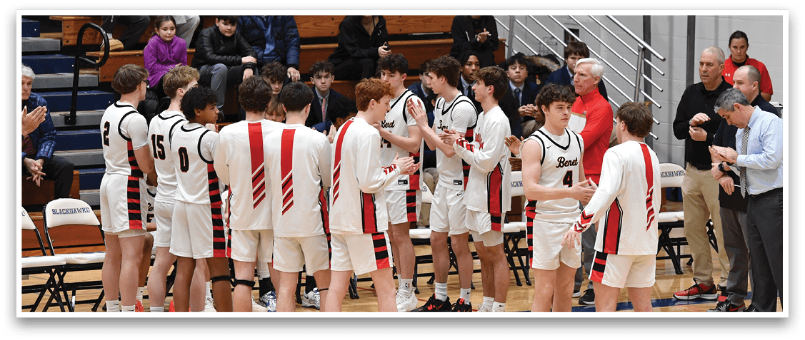 A group of young men in uniforms are standing on a basketball court. AI generated content