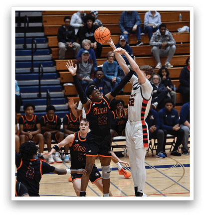 A basketball game is in progress with players on the court and a crowd watching. A man is holding a basketball and appears to be dribbling it. There are several other people in the scene, some of whom are wearing uniforms. A bench is visible in the background. AI generated content