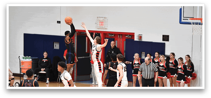 A group of people playing basketball on a court. AI generated content