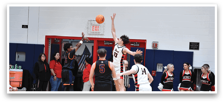 A group of people playing basketball, with one player jumping to block a shot. AI generated content