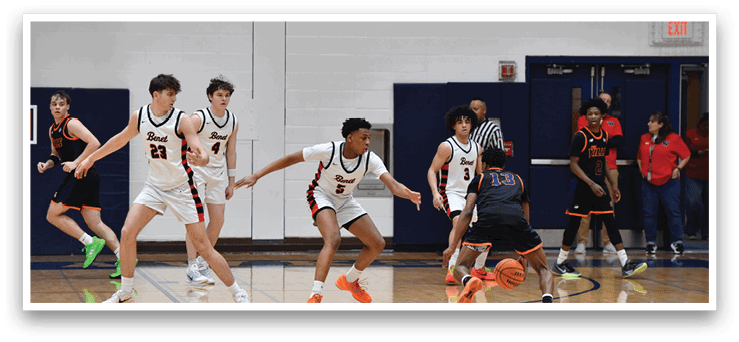 A group of basketball players are on the court, with one player attempting to steal the ball from another player. AI generated content