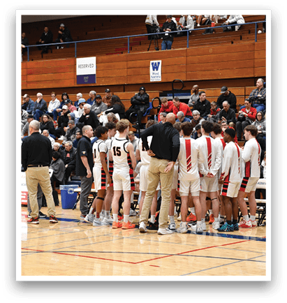 A group of men in uniforms stand on a basketball court, facing each other. AI generated content