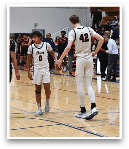 A group of young men playing basketball on a court. AI generated content