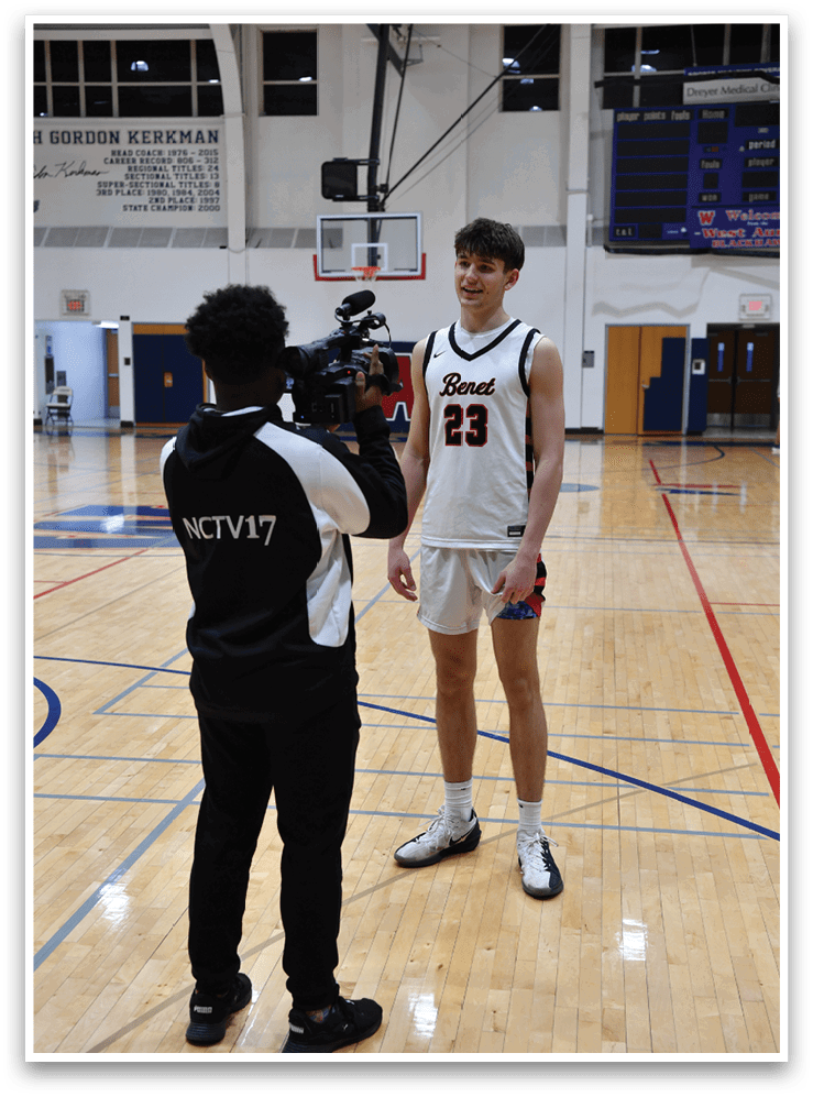 Two men are standing on a basketball court, one of them holding a camera. AI generated content