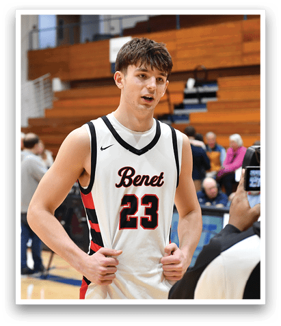 A man wearing a basketball jersey stands in front of a camera. AI generated content