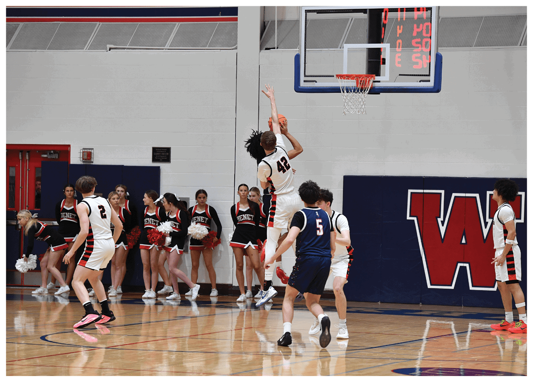 A basketball player is jumping to hit the ball, while a crowd of people watch. AI generated content