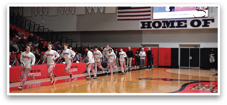 A group of people are running on a basketball court. AI generated content