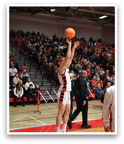 A basketball player is jumping in the air to catch a basketball. AI generated content