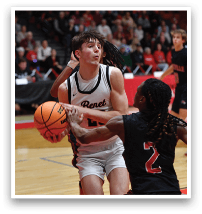 Two basketball players are playing, one with a red jersey and the other with a black jersey. The red jersey player is trying to block the shot of the black jersey player who is attempting to score. AI generated content