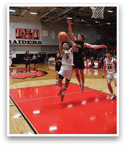 A basketball game is taking place with two teams playing. One player is jumping up to shoot the ball while another player tries to block the shot. The crowd is watching the game intently. AI generated content