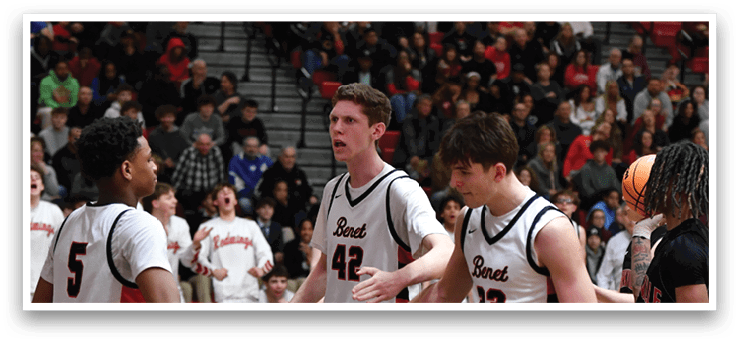 A group of men playing basketball, with one player holding a ball. AI generated content