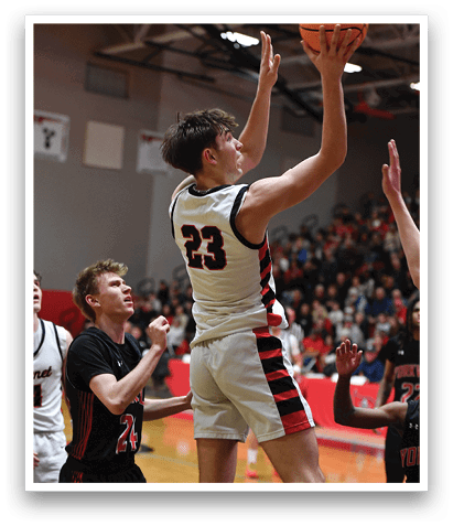 A basketball player is reaching for a ball while another player tries to block him. AI generated content