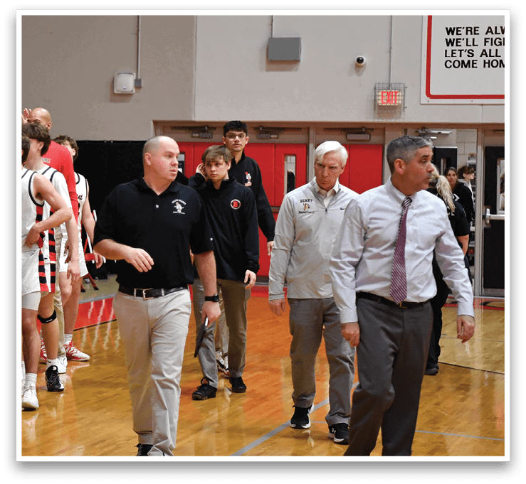 A group of men in a gym shake hands with each other. AI generated content