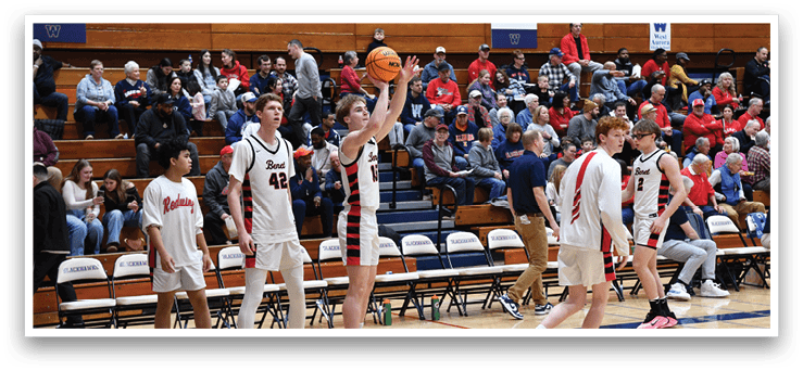 A basketball player is dribbling a ball on the court, while other players watch. AI generated content