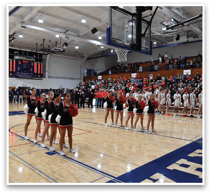 A group of cheerleaders are on the court, ready to perform. AI generated content