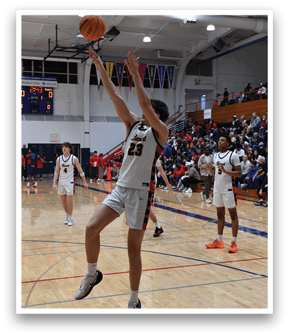 Basketball players on a court, one of them jumping to catch a ball. AI generated content