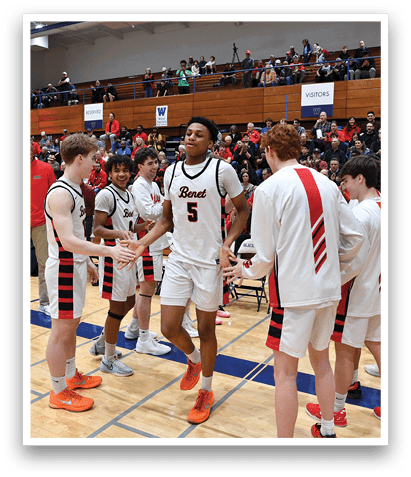 A group of young men are on a basketball court, shaking hands with each other. AI generated content