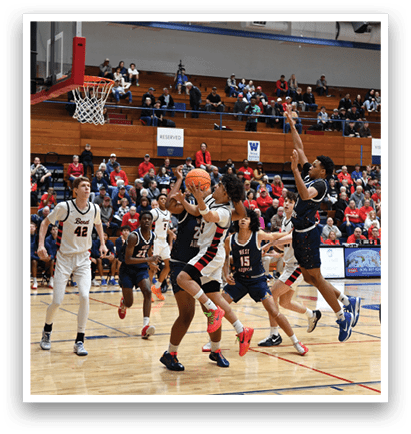 A group of men playing basketball on a court. AI generated content