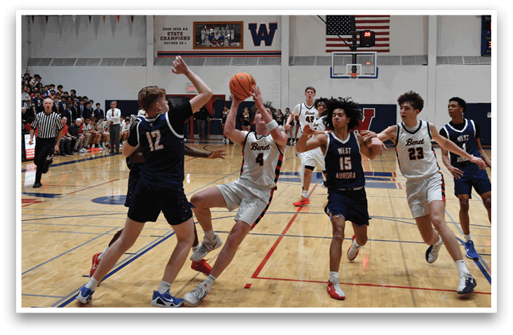 A group of young men playing basketball on a court. AI generated content