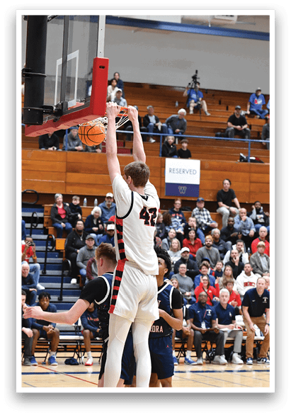 A basketball player is jumping to hit the ball in a game. AI generated content