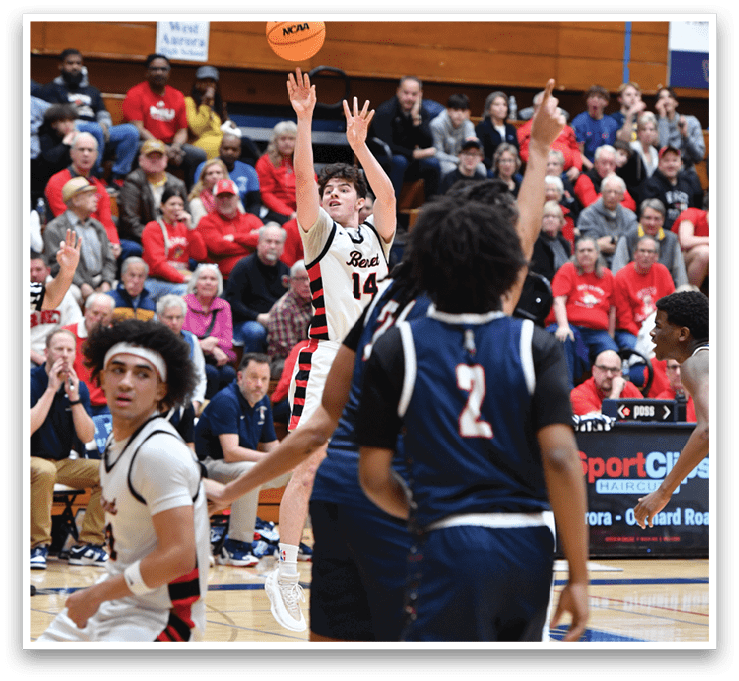 A basketball player is reaching for the ball while other players look on. The crowd watches intently as the game unfolds. AI generated content