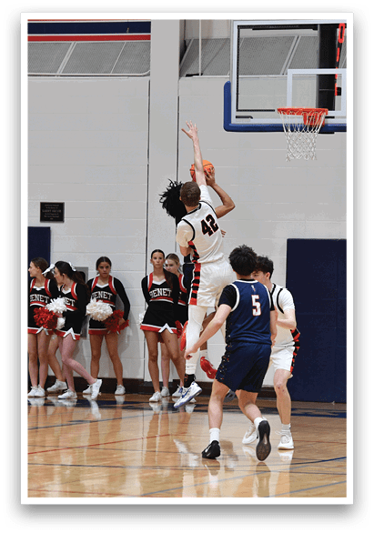 A basketball player is jumping to hit the ball, while a crowd of people watch. AI generated content