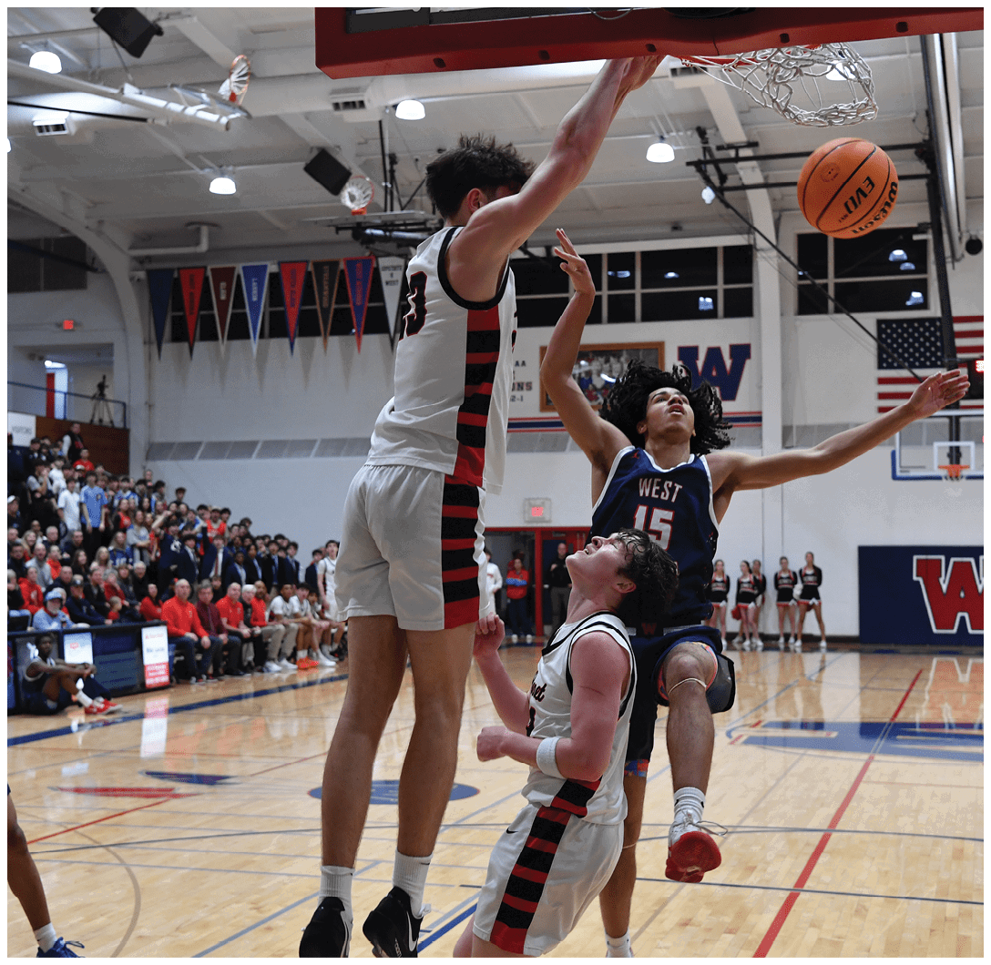 A basketball game is taking place with two men fighting for the ball. The crowd is watching intently as the players try to gain possession of the ball. AI generated content