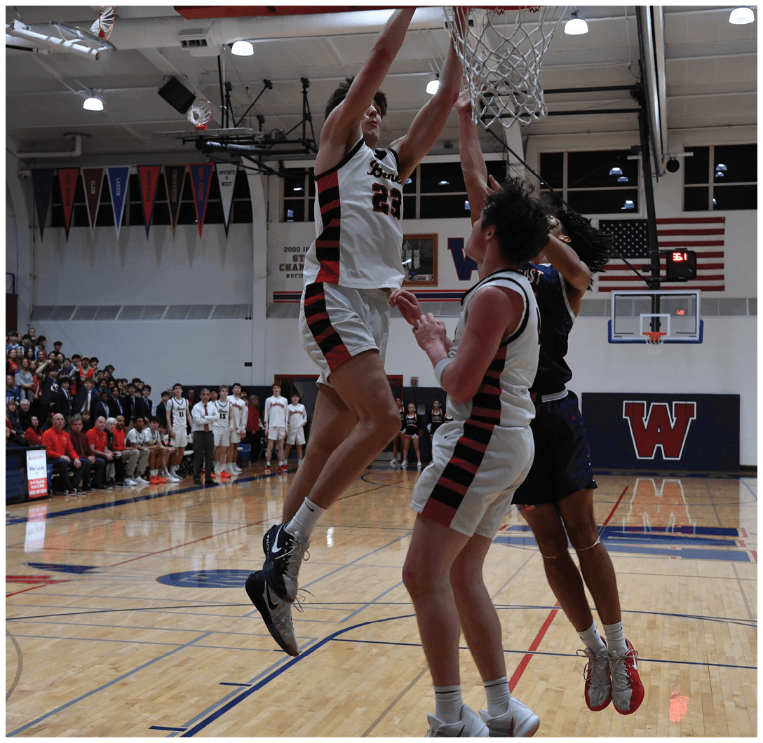 Basketball players jumping for the ball in a game. AI generated content