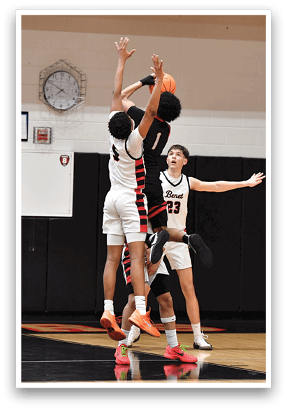 Two basketball players are fighting for the ball in a game. AI generated content