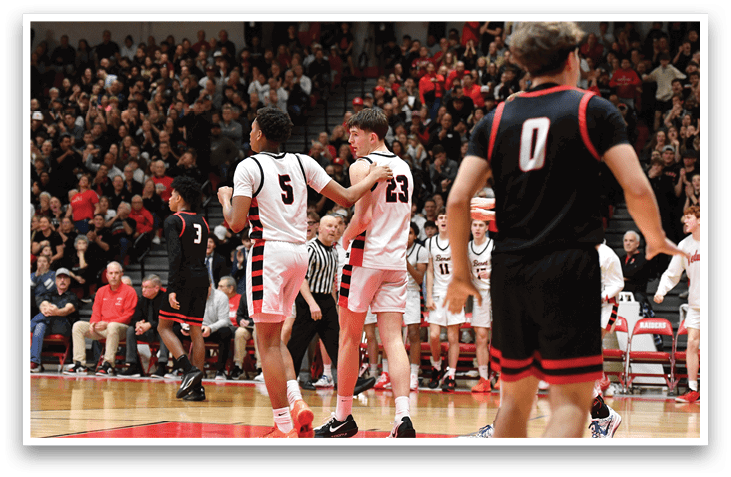 A group of basketball players on a court, with one player holding his head in his hands. AI generated content
