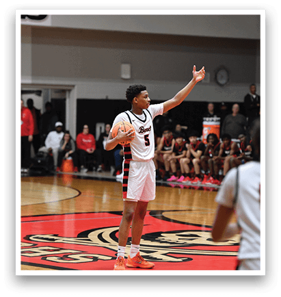 A basketball player wearing a white jersey stands on the court, holding his arms out. AI generated content