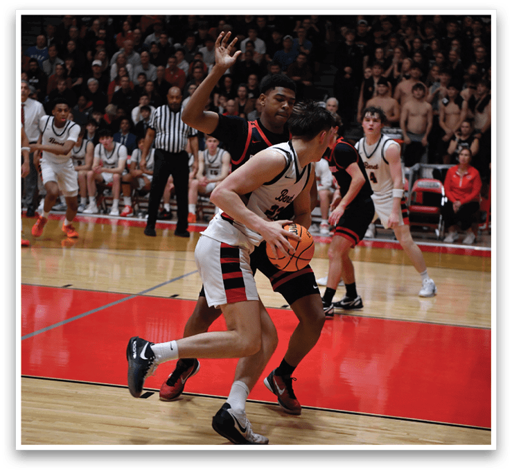 Two basketball players are fighting for the ball on the court. AI generated content