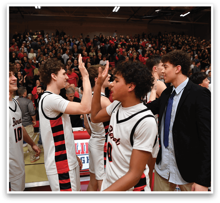 A group of young men celebrating a victory on the basketball court. AI generated content