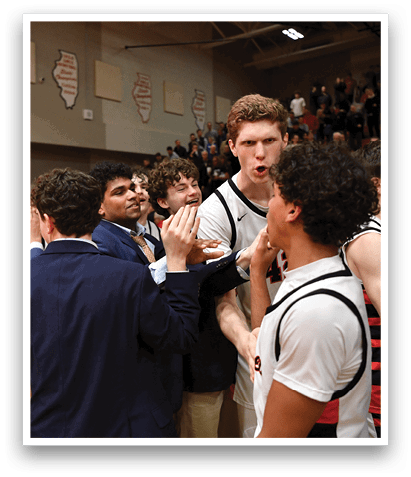 A group of people are celebrating a victory on a basketball court. AI generated content