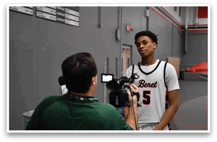 A man wearing a basketball jersey stands in front of a camera. AI generated content