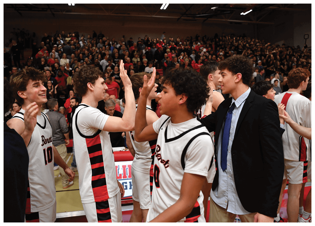 A group of young men celebrating a victory on the basketball court. AI generated content