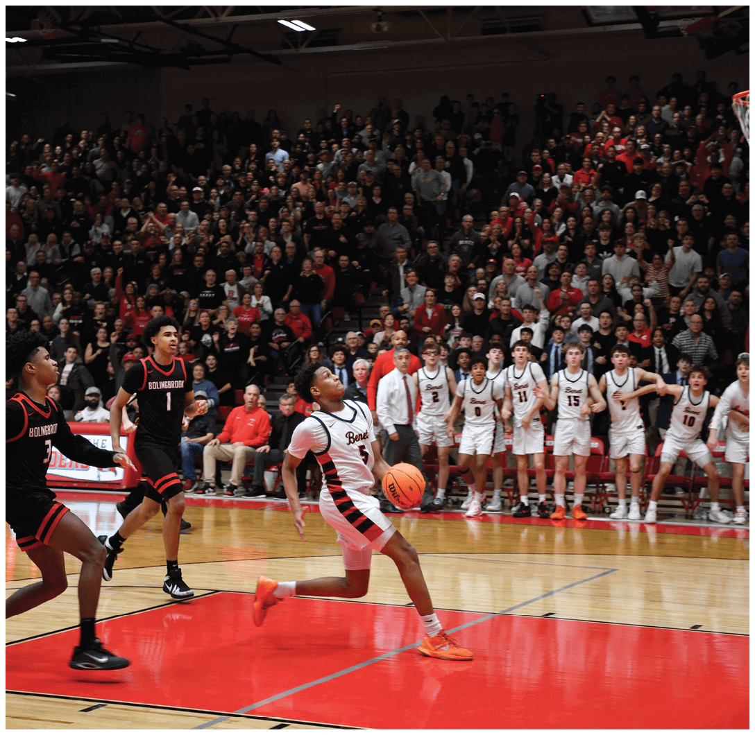A basketball game is in progress with a player running towards the basket. AI generated content