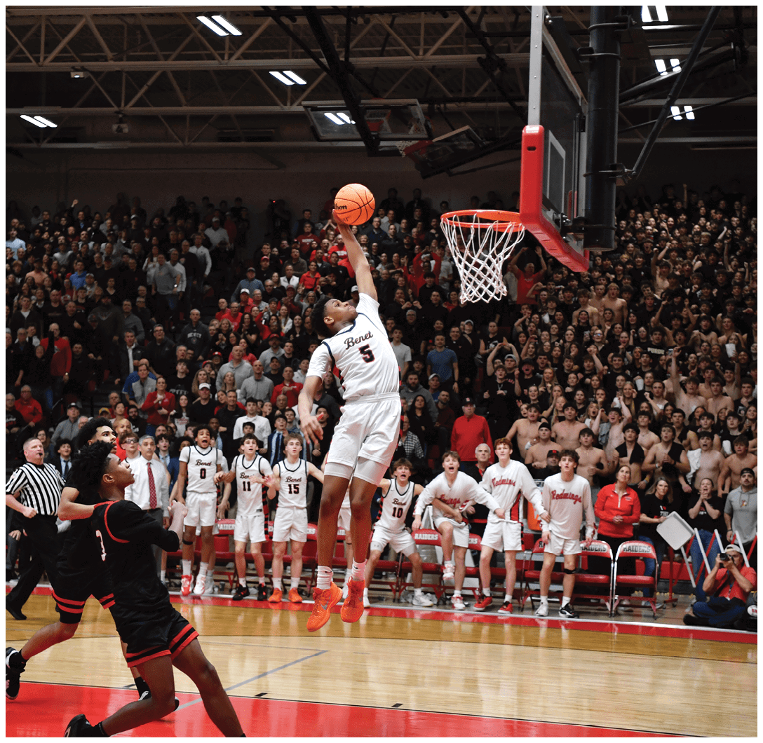 A basketball player leaps into the air to dunk the ball. AI generated content