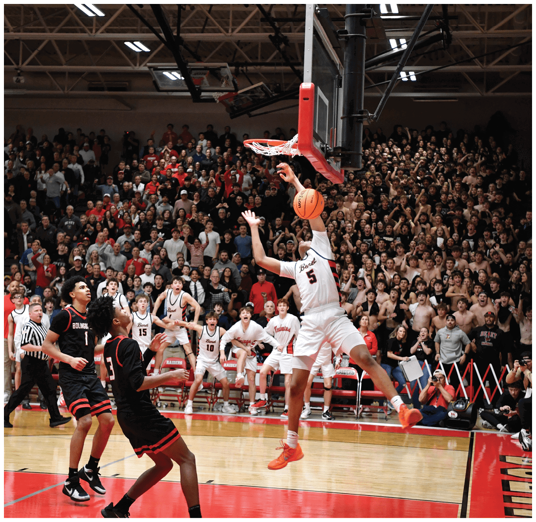 A basketball player is jumping in the air to shoot a basket. AI generated content