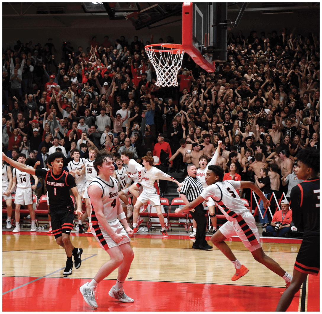A basketball game is taking place with a crowd of people watching. The players are actively engaged in the game, with one player attempting to score a basket. The crowd is cheering and showing their support for the players. AI generated content