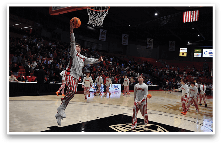 A basketball player leaps into the air to shoot the ball. AI generated content