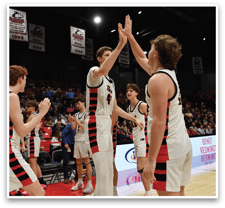 A group of men are celebrating on a basketball court. AI generated content