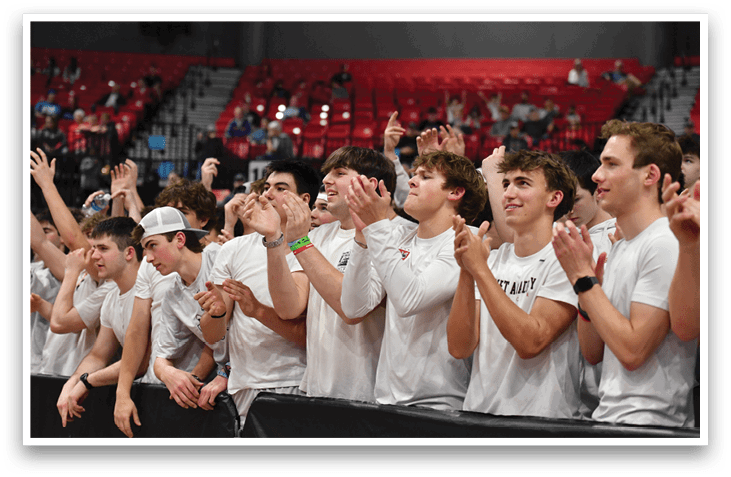 A group of young men wearing white shirts are clapping and cheering. AI generated content