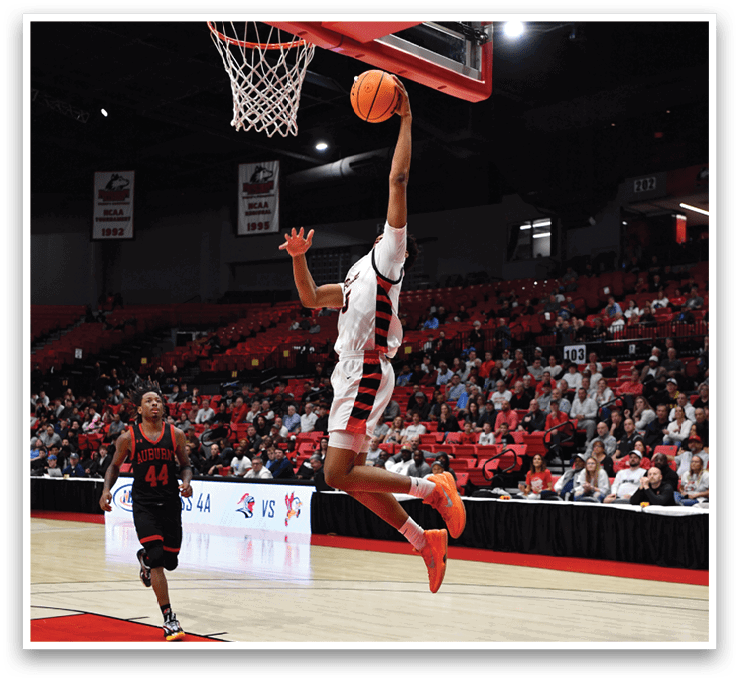 A basketball player is jumping in the air to hit the ball. AI generated content