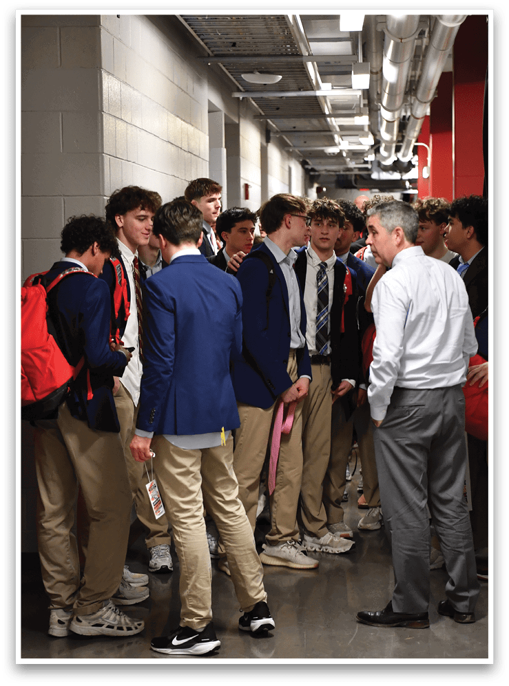 A group of young men wearing suits and ties are gathered in a hallway. AI generated content
