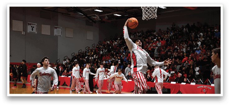 A basketball player leaps to dunk the ball through the hoop. AI generated content